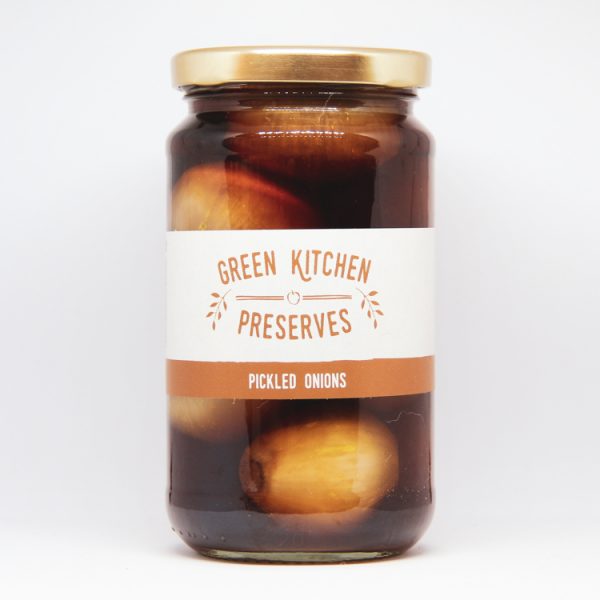 a large jar of pickled onions on a white background